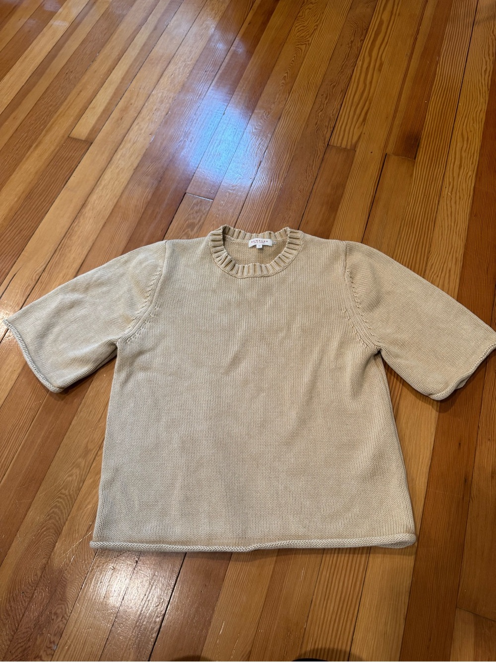 Women's Cream Short-Sleeve Knit Top with rolled hem butter yellow color size xs